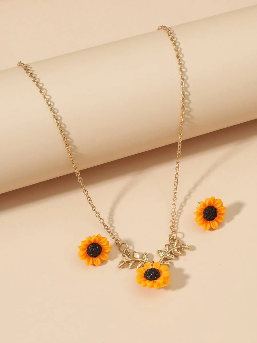 10058 b03-12 Collar y aretes de girasol