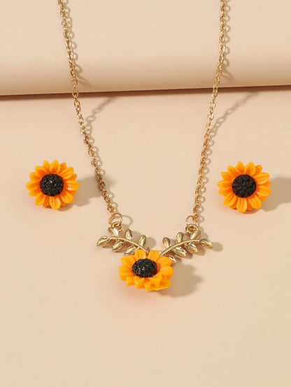 10058 b03-12 Collar y aretes de girasol