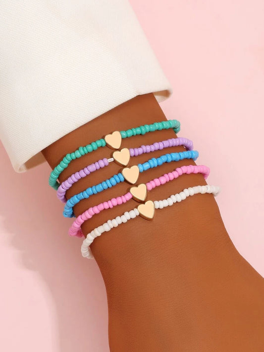 10946 1b-01-13 set cinco piezas Pulsera con adorno de corazón