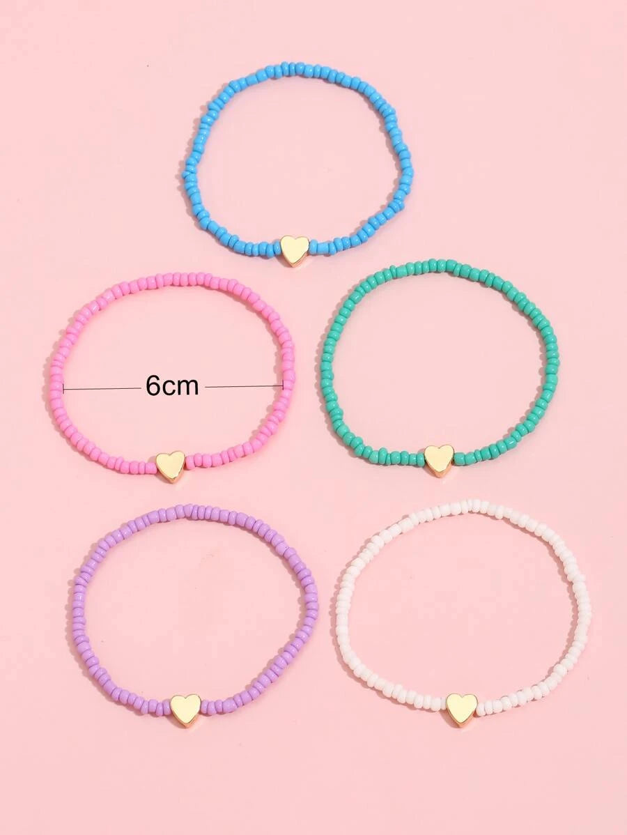 10946 1b-01-13 set cinco piezas Pulsera con adorno de corazón