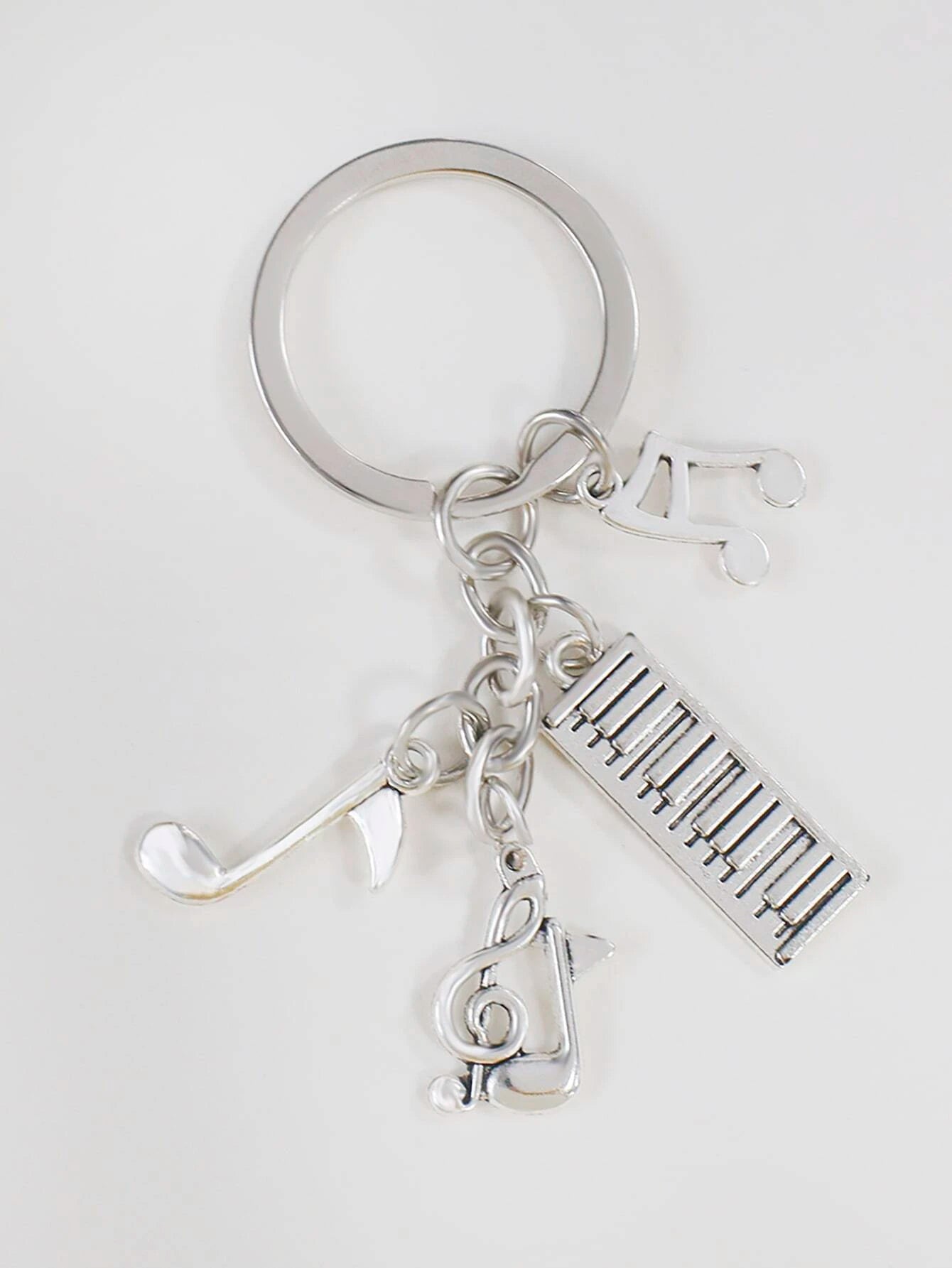 7272 b01-15 Llavero De Moda Con Colgante De Nota Musical