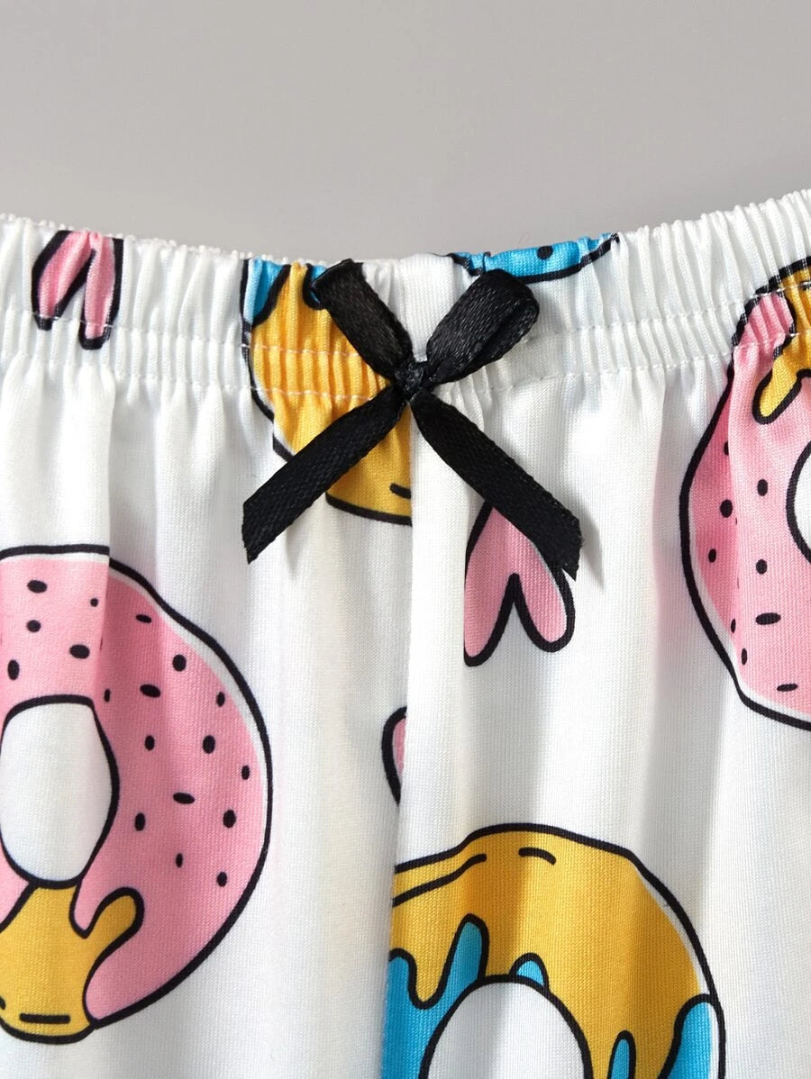 8320 1a-010 Conjunto de pijama de tirantes con estampado de dónuts ribete en forma de lechuga