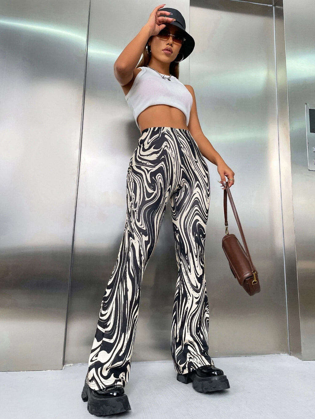 7742 1t-007 Pantalones acampanados con estampado de mármol