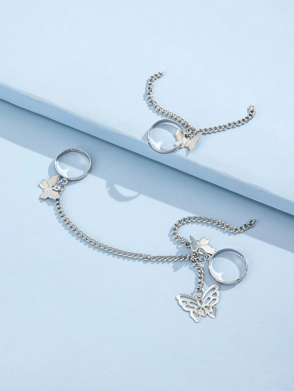 10621 1b-031 Dos piezas Anillo con diseño de cadena y de mariposa