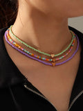 6057 b03-09  Tres piezas Collar con cuenta con adorno de corazón
