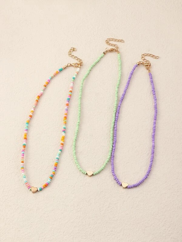 6057 b03-09  Tres piezas Collar con cuenta con adorno de corazón