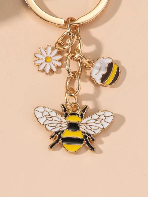 5377 a09-12  Llavero con abalorio de abeja y flor