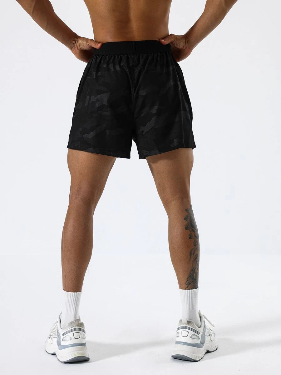 8928 1t-006 Short deportivo con estampado de camuflaje con bolsillo para teléfono
