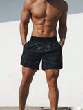 8928 1t-006 Short deportivo con estampado de camuflaje con bolsillo para teléfono