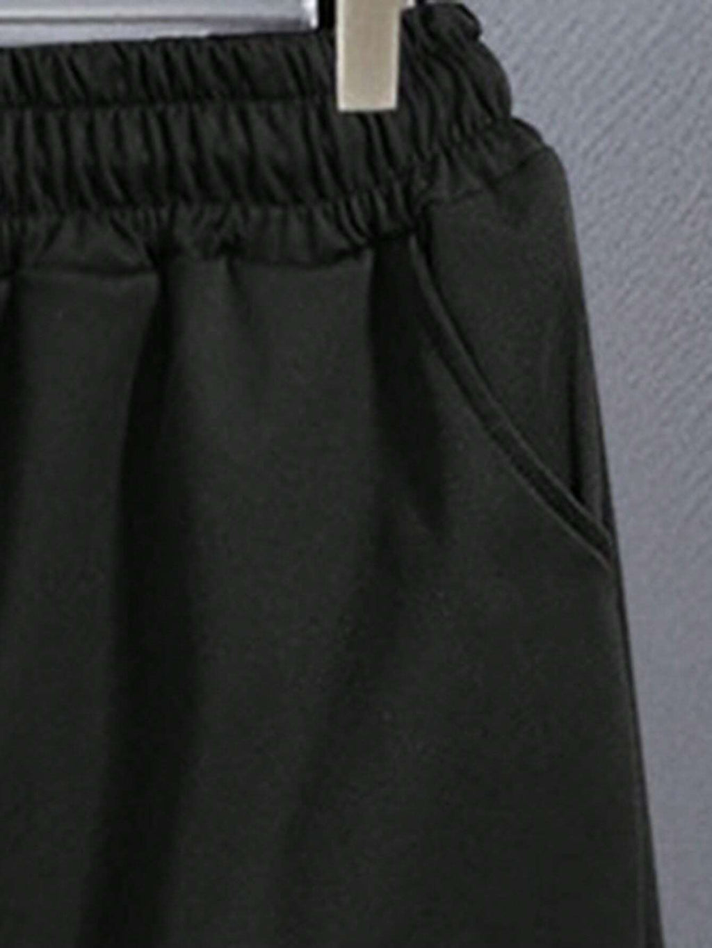 6299 a03-05 Conjunto Shorts con camiseta de hombros caídos con estampado de letra