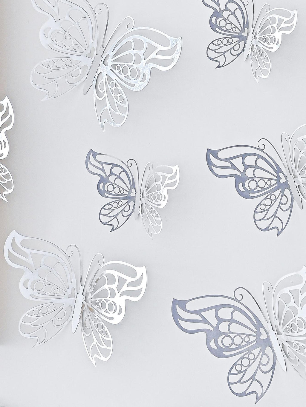 8133 a13-03 Doce piezas hueco 3d holográfico plata con mariposa creativo papel decorativo Pegatina para casa adorno