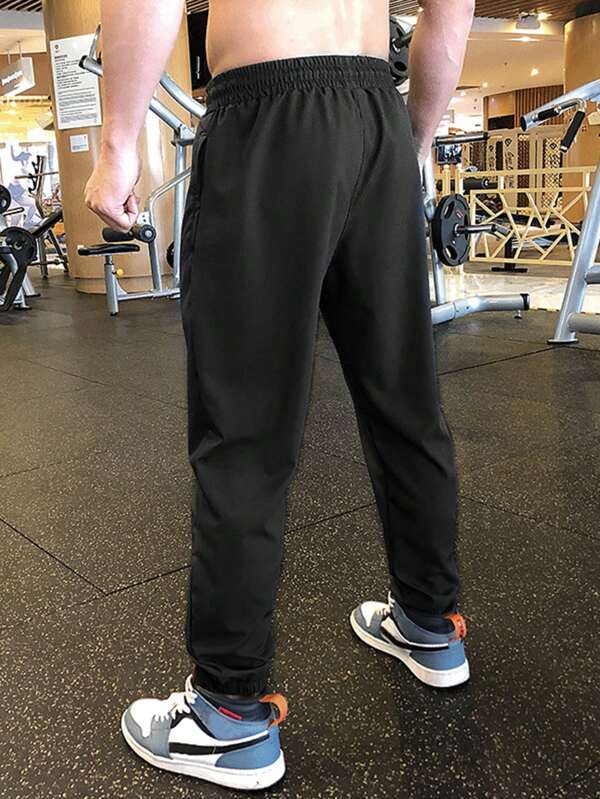 7693 1t-209 Pantalones deportivos con estampado de letra de cintura con cordón