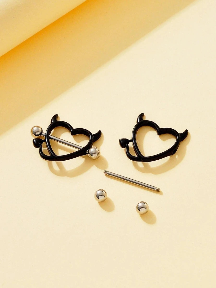 9999 1b-028 Dos piezas Anillo de pezón con adorno de corazón