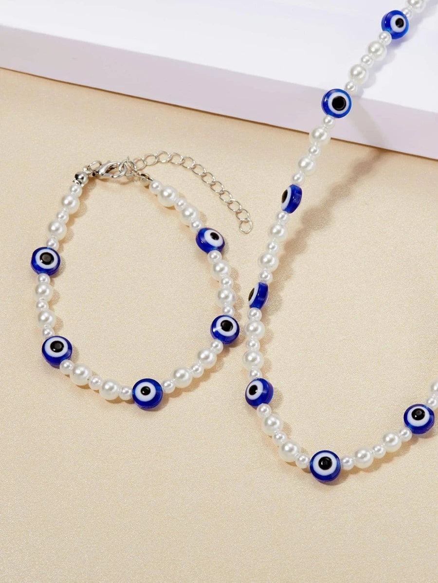 10032 1b-058 Collar con diseño de ojo con cuenta con perla artificial con pulsera