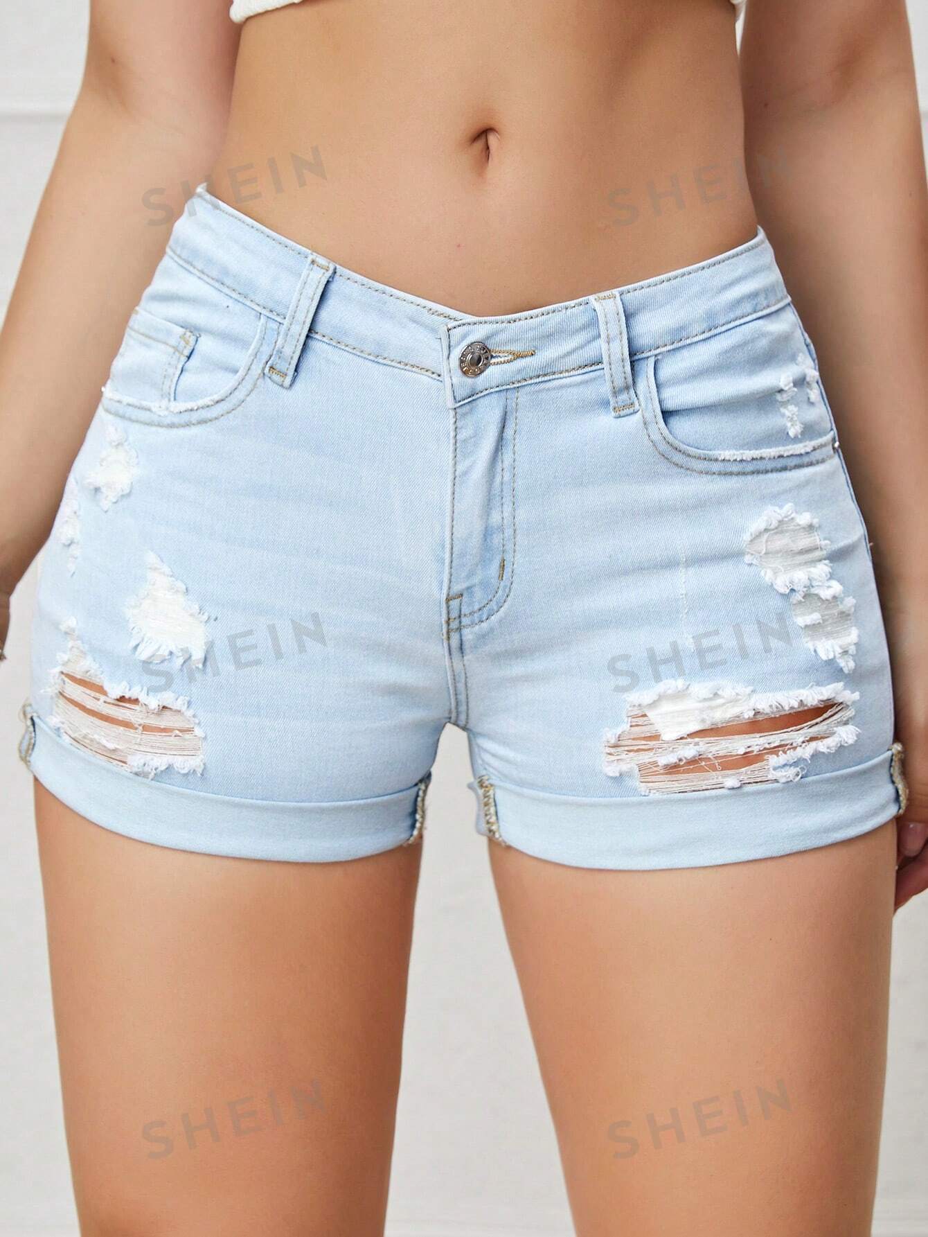 17501 1t-007 Short SOFVE en mezclilla desgarro bajo de doblez 1 Pza