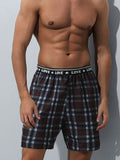 4938 1t-006 Hombres Shorts de dormir con estampado de cuadros en contraste con cinta con letra