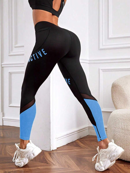 9550 1a-055 Leggings deportivos con estampado de letra de color combinado de malla con bolsillo para teléfono