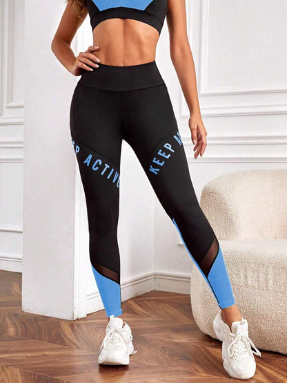 9550 1a-055 Leggings deportivos con estampado de letra de color combinado de malla con bolsillo para teléfono