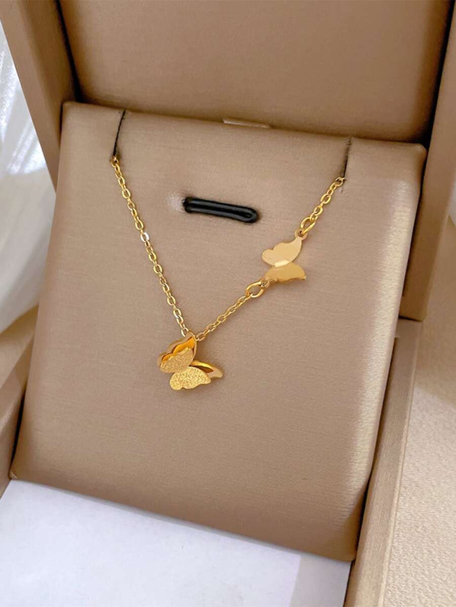 10042 1b-076 Set dos piezas de acero inoxidable colgante de mariposa Collar con Pendientes