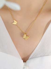 10042 1b-076 Set dos piezas de acero inoxidable colgante de mariposa Collar con Pendientes