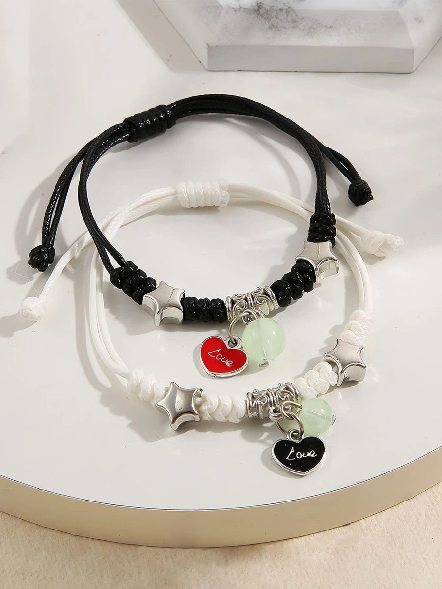 9600 b01-01 Dos pulseras de pareja trenzadas con corazón blanco y negro con luz nocturna