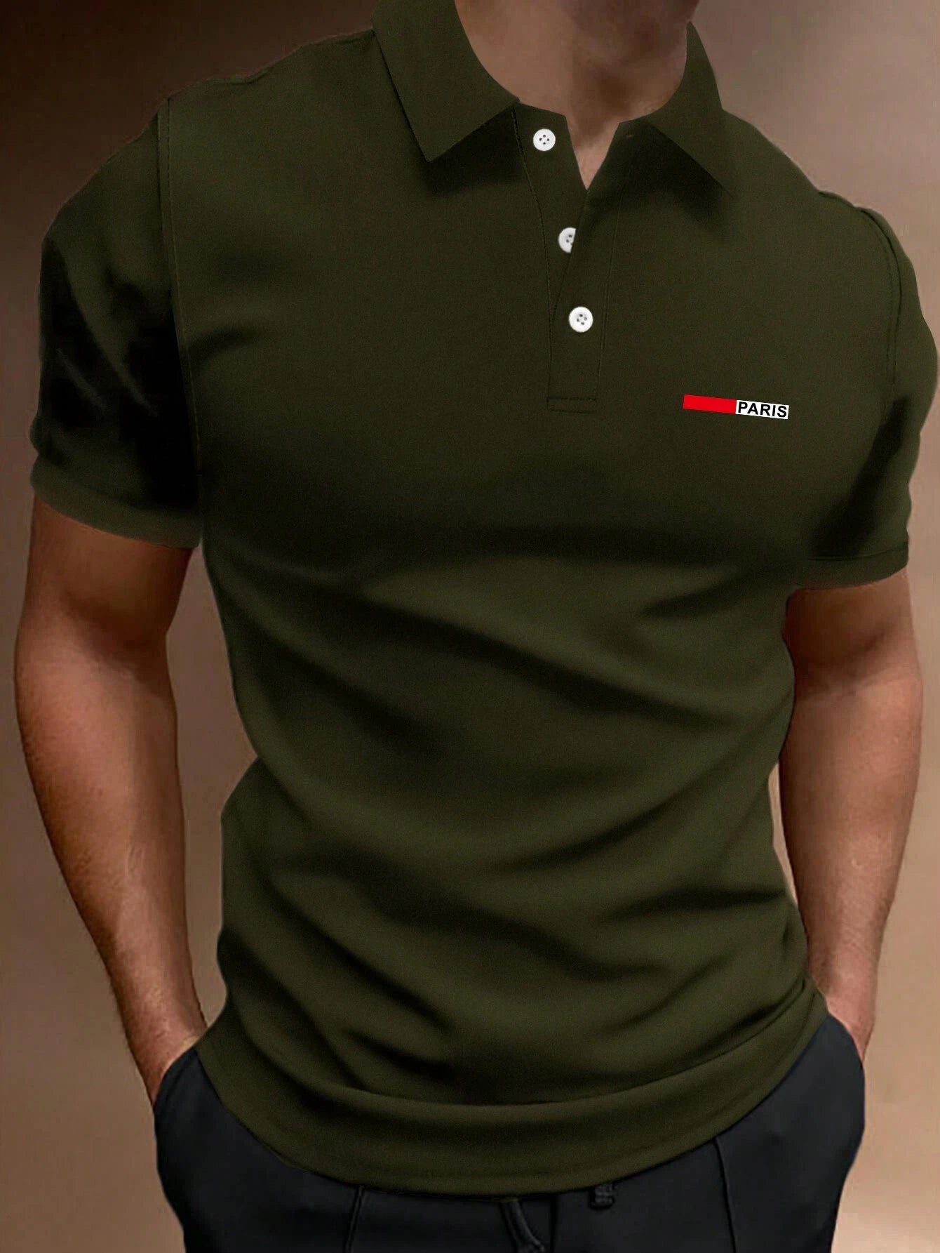 7799 08-07 Camisa polo con estampado de letra