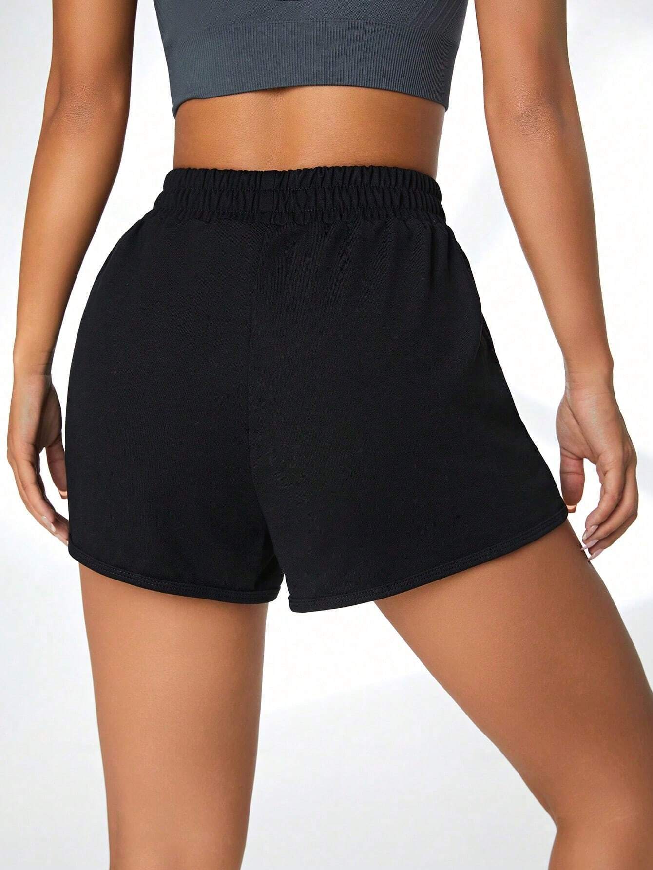 5642 1t-011 Shorts deportivos con estampado de letra