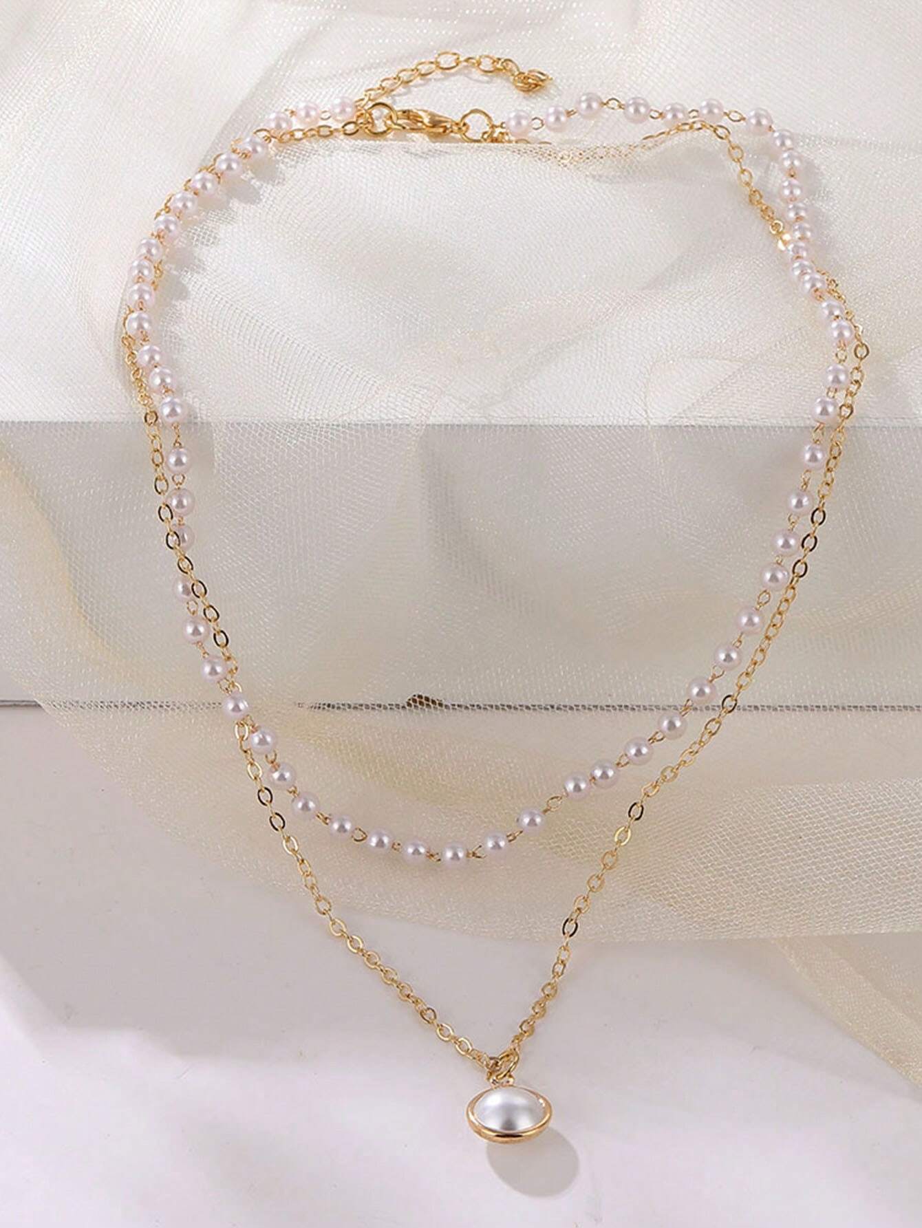 5881 a09-03 Cadena lujosa de doble capa con perla colgante de mujeres gama alta clavícula con