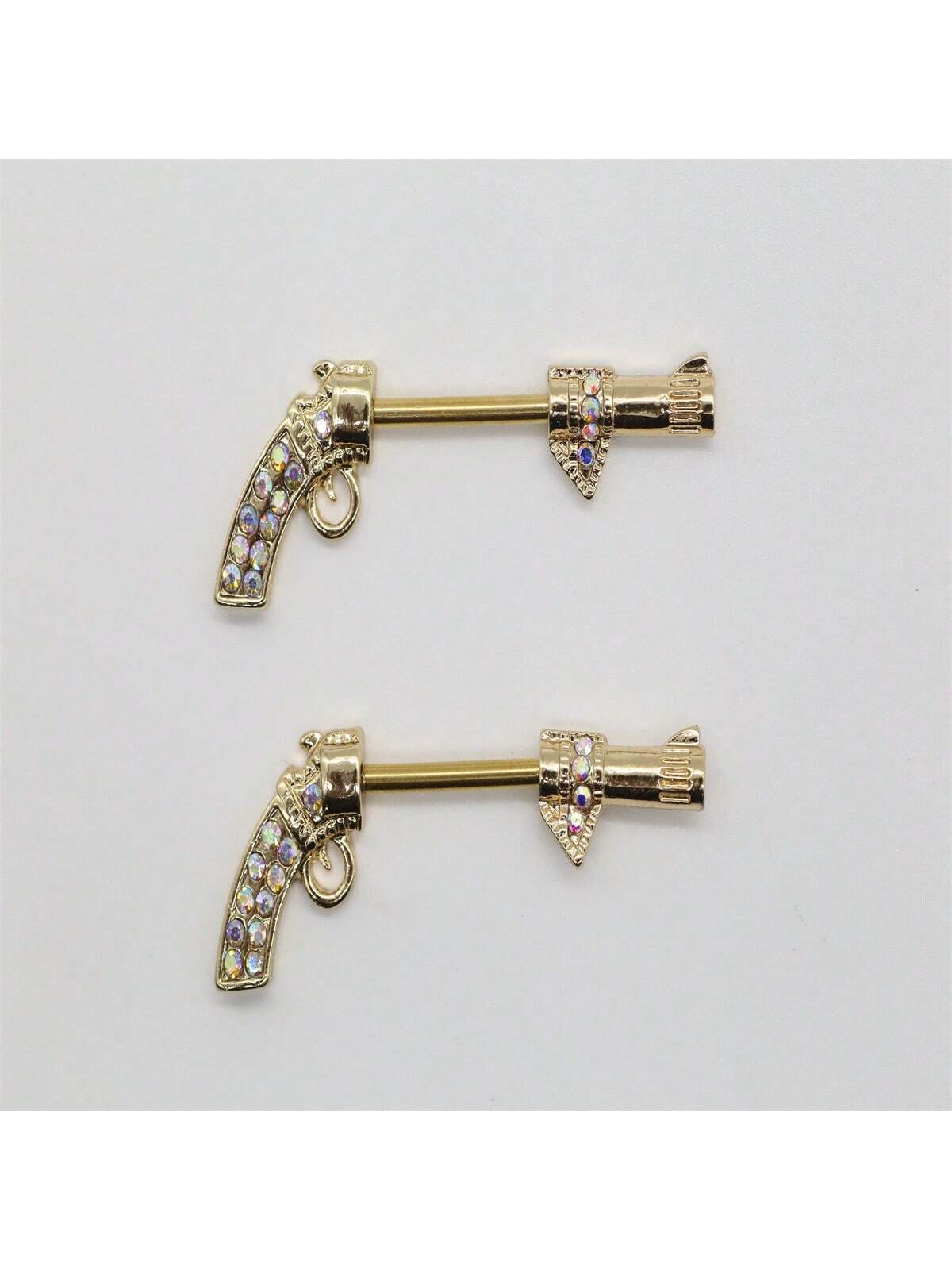 10011 1b-076 Anillos para pezones chapados en oro y con decoración de gemas