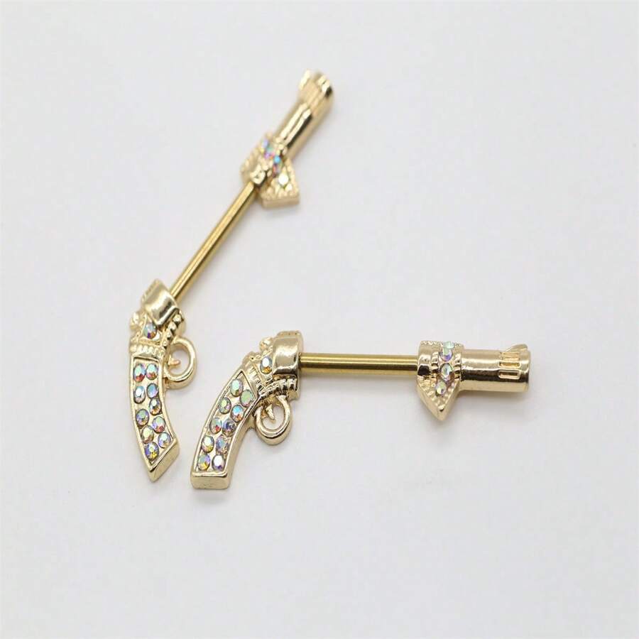 10011 1b-076 Anillos para pezones chapados en oro y con decoración de gemas