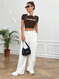 8160 1a-103 Camiseta crop con estampado de slogan