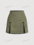 10562 a01-07 Falda con diseño de lazo ribete con encaje bajo con abertura de pana SHEIN MOD