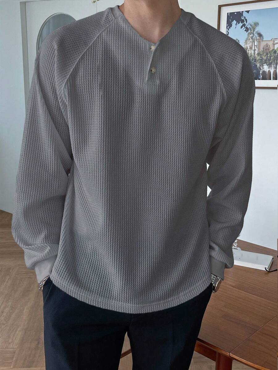9911 a07-09 Camiseta con botón delantero de manga raglán