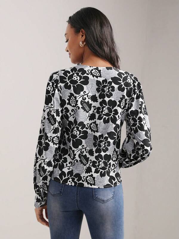7240 1a-046 Blusa con estampado floral de manga con abertura