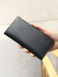 7626 1t-002 Una Cartera De Piel Sintética Negra