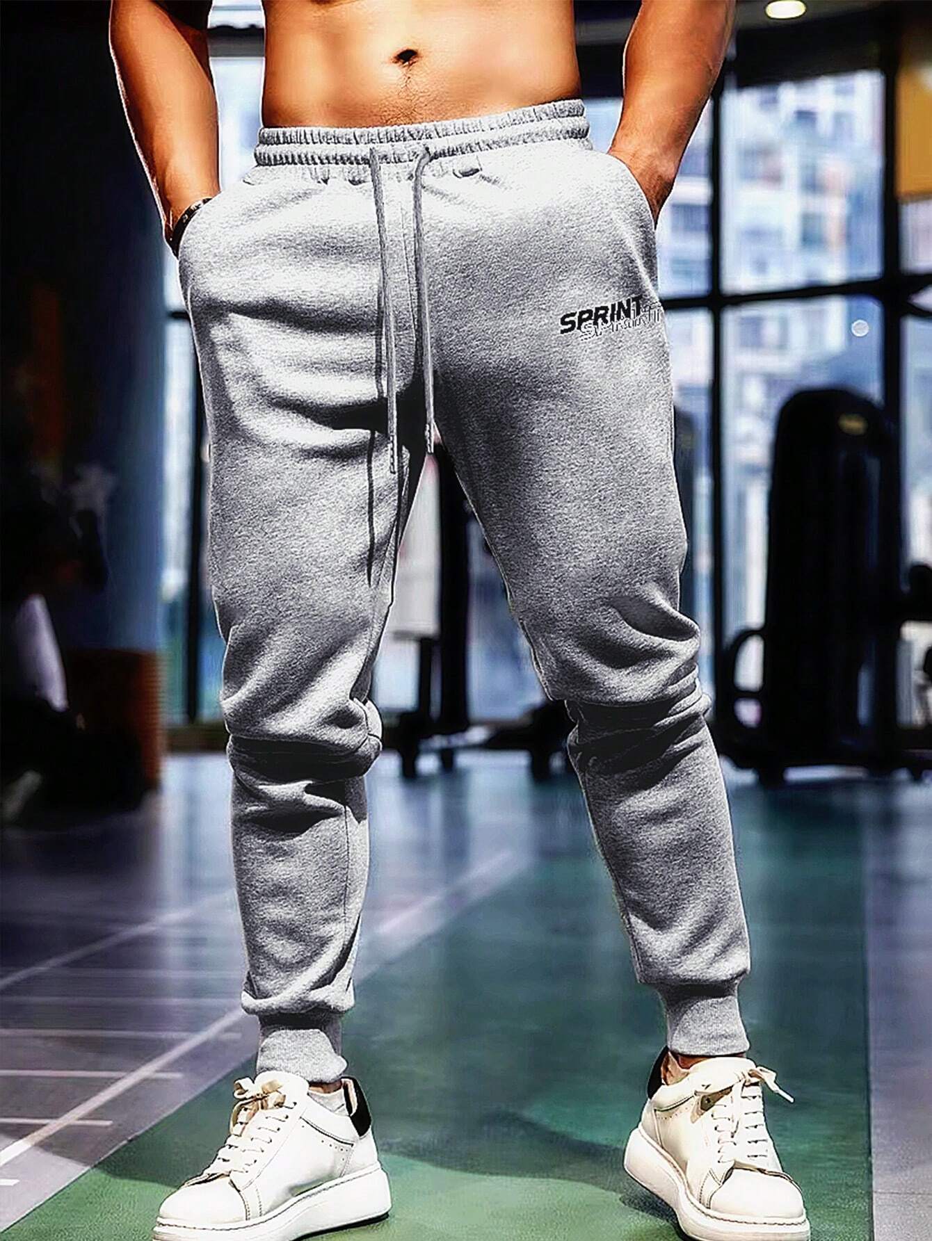 7858 1t-209 Pantalones deportivos con estampado de letra de cintura con cordón con bolsillo