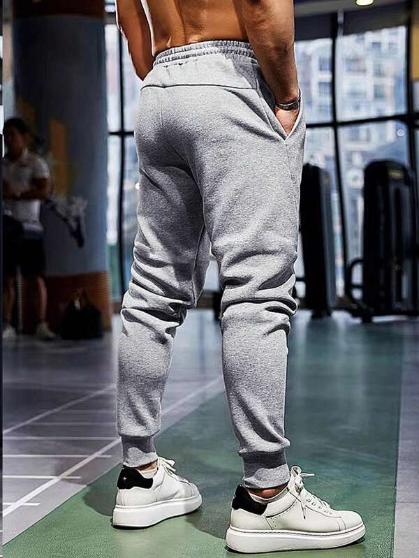 7858 1t-209 Pantalones deportivos con estampado de letra de cintura con cordón con bolsillo
