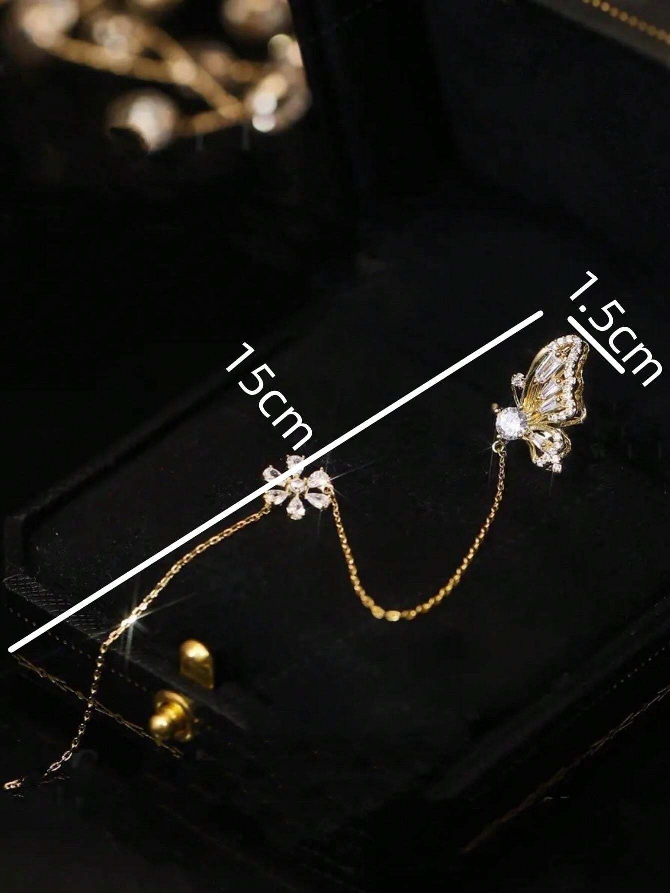 7836 1b-052 Un pendiente en forma de mariposa para mujer