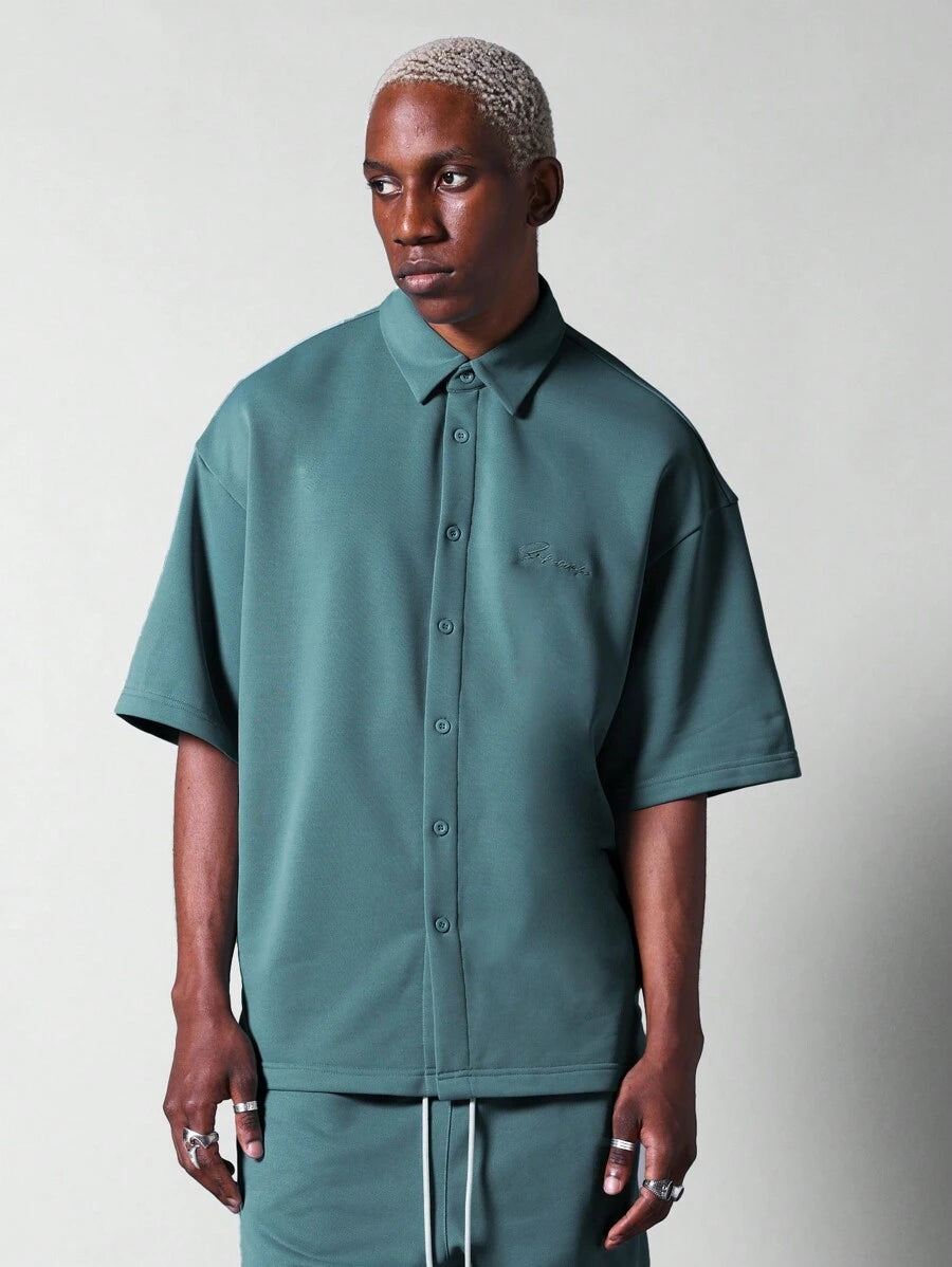 13799 1t-006 Camisa 1 pieza oversize de punto con logo bordado