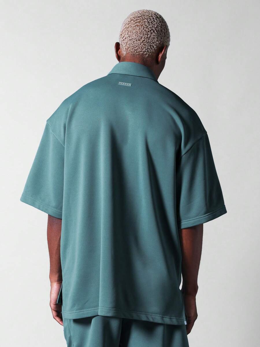 13799 1t-006 Camisa 1 pieza oversize de punto con logo bordado