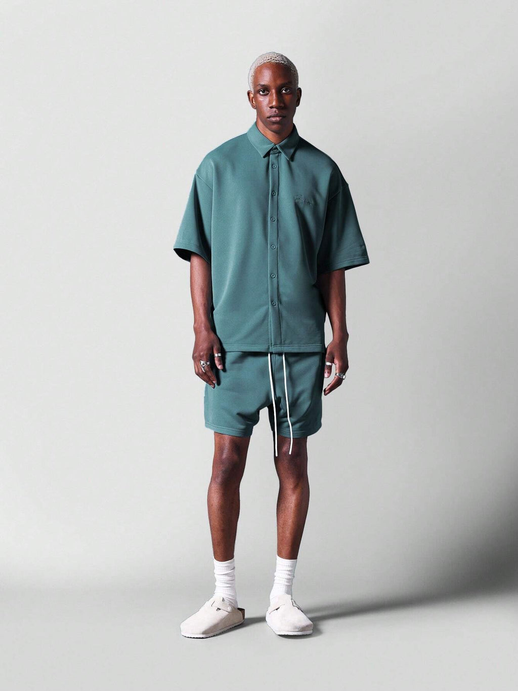 13799 1t-006 Camisa 1 pieza oversize de punto con logo bordado