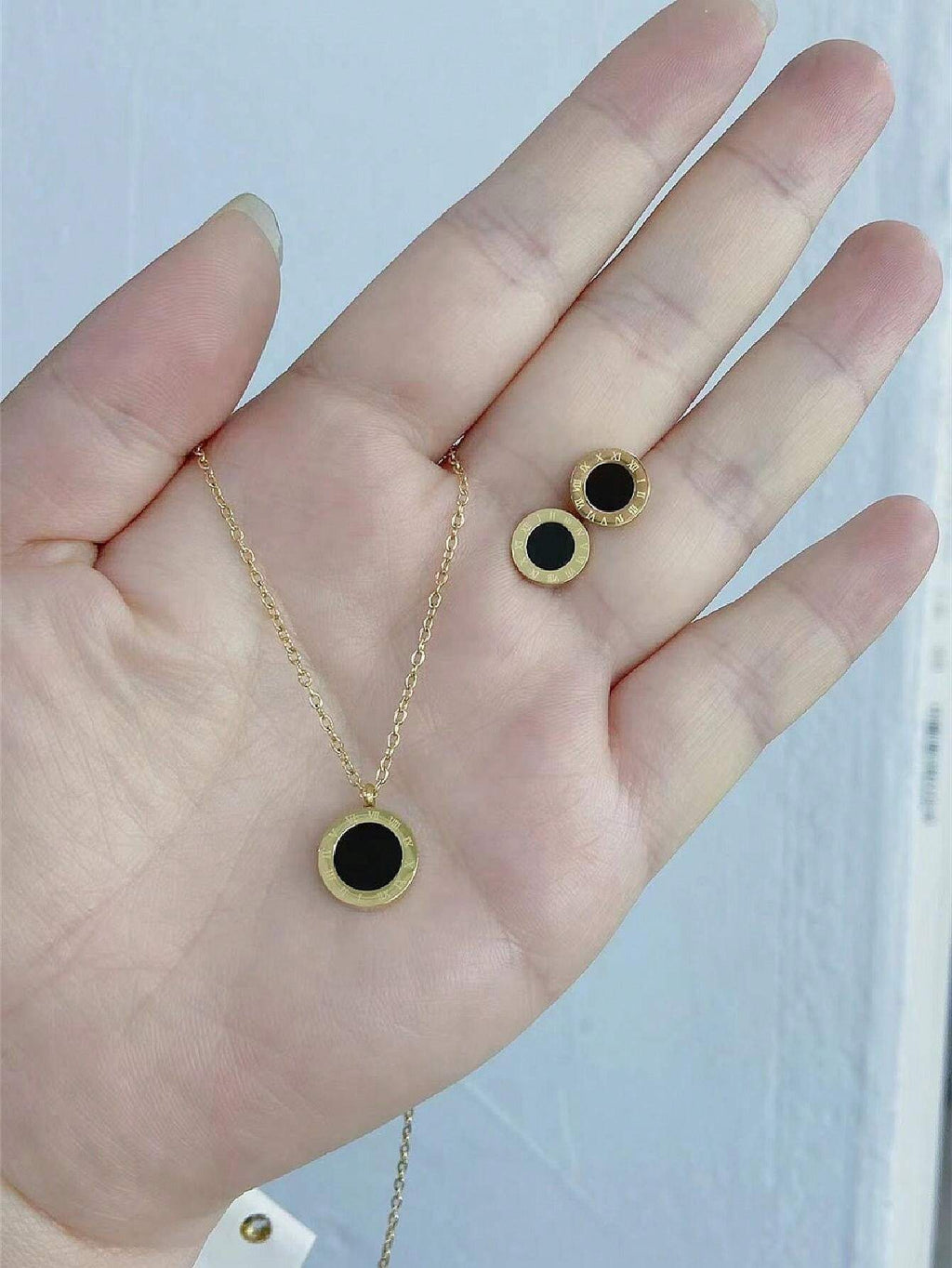 10055 1b-072 Set de Collar Y Pendientes Romanos De Acero De Titanio