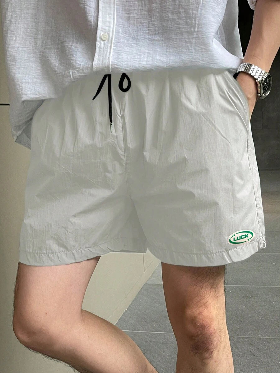 13810 1t-012 Shorts casuales holgados para hombre con cintura de cordón