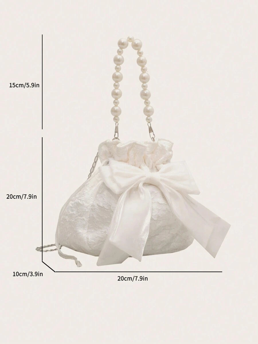14924 1c-02-09 Mini Bolso de cubo con cadena texturizada decorada con imitación de perlas y lazo.