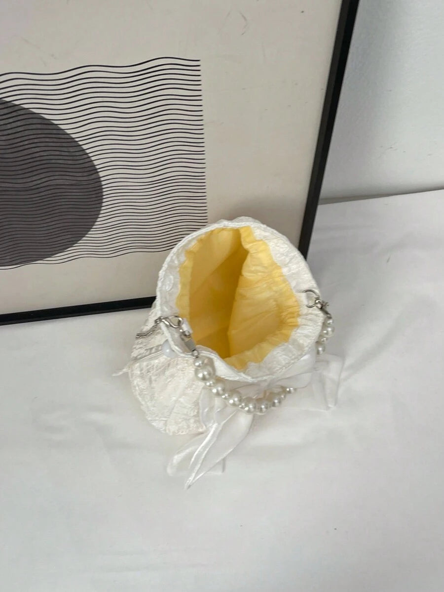 14924 1c-02-09 Mini Bolso de cubo con cadena texturizada decorada con imitación de perlas y lazo.