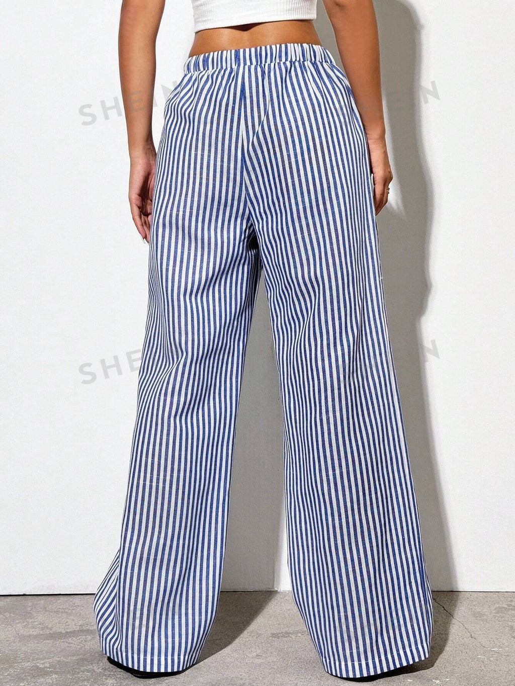 16545 1a-006 Pantalón azules a rayas 1 Pza