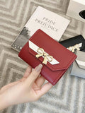 15424 1b-060Cartera trifold con lazo 1 Pza