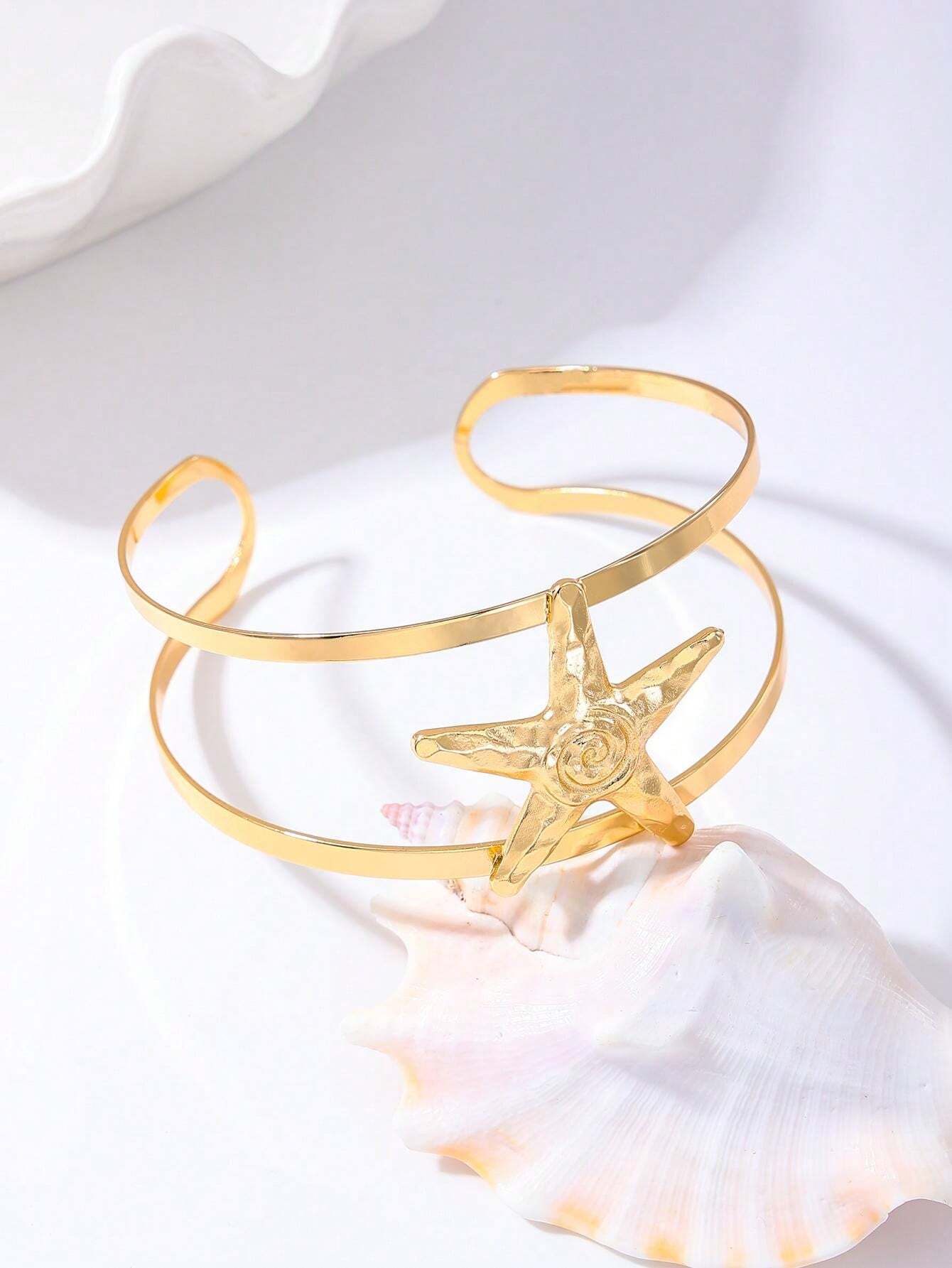 15177 1b-04-07 Brazalete de mujer de línea doble con estrella y estrella de mar abierto