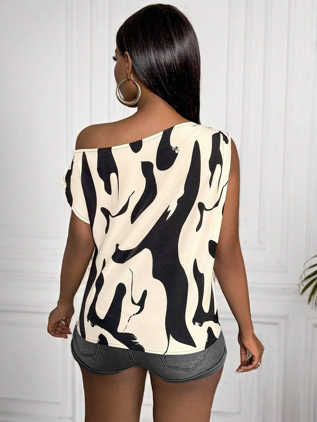 17423 1t-007 Blusa con cuello asimétrico 1 Pza