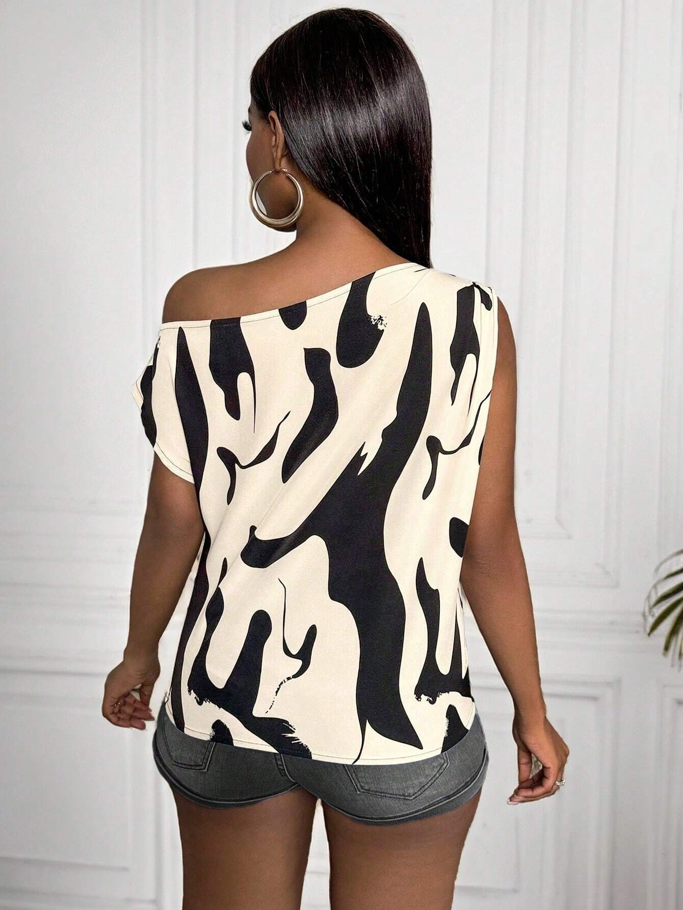 17423 1t-007 Blusa con cuello asimétrico 1 Pza